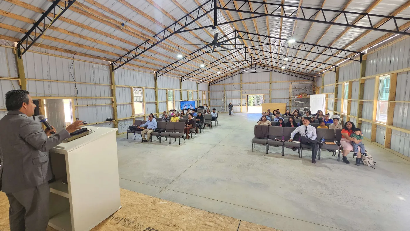 Pastor preaching to the congregation during a worship service